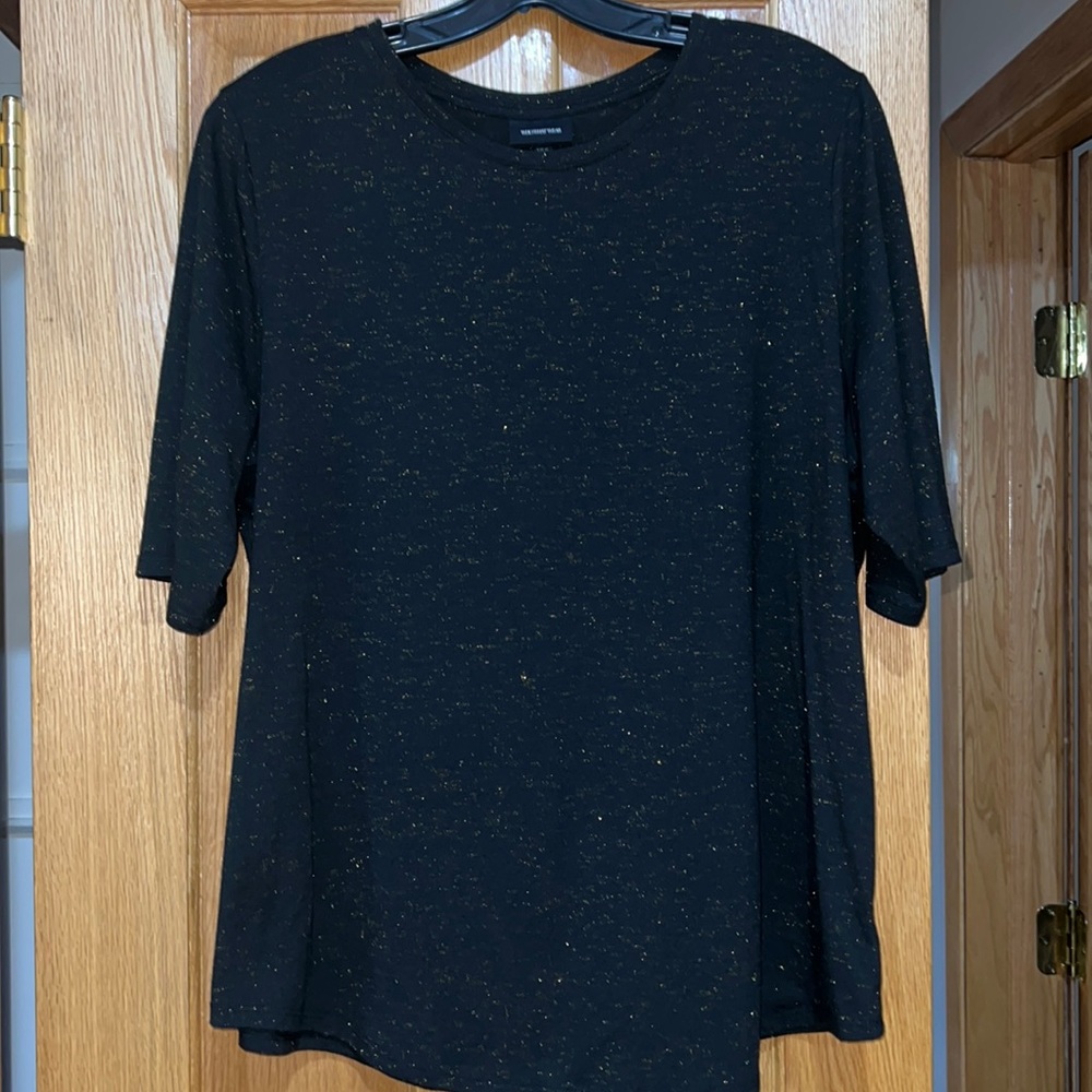 Black top with gold woven accents